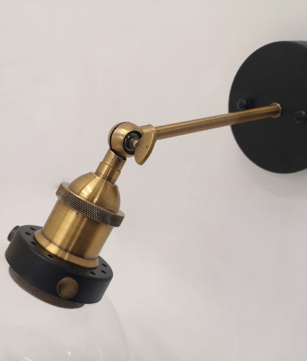 PESINI: Interior Swing Arm Glass with Antique Brass